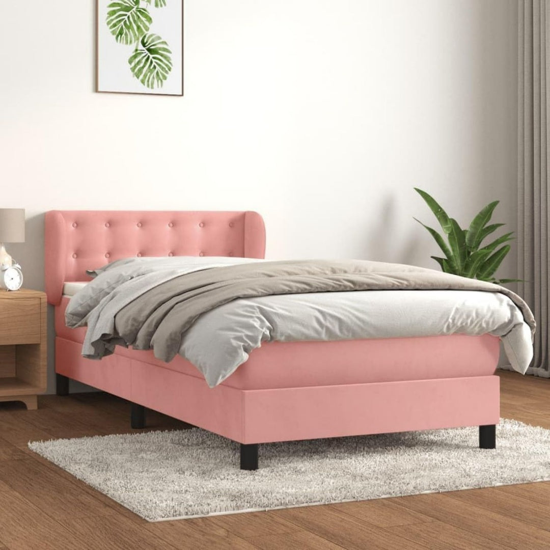 Das Boxspringbett zeigt Hoehenverstellung in Rosa