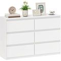 Sideboard verbindet beschichtete Flaechen und grifflose Fronten